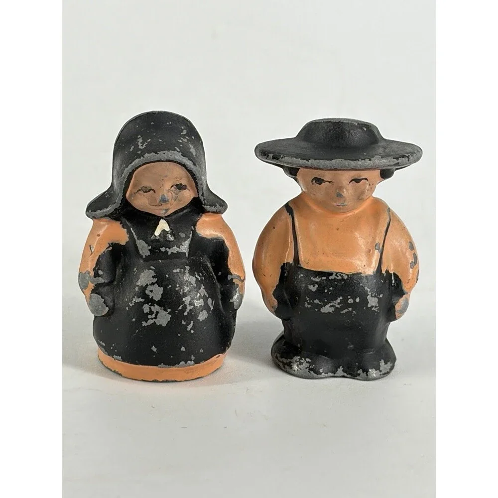 Vintage Cast Iron Salt & Pepper Shakers Amish Couple Man & Woman Peach Black